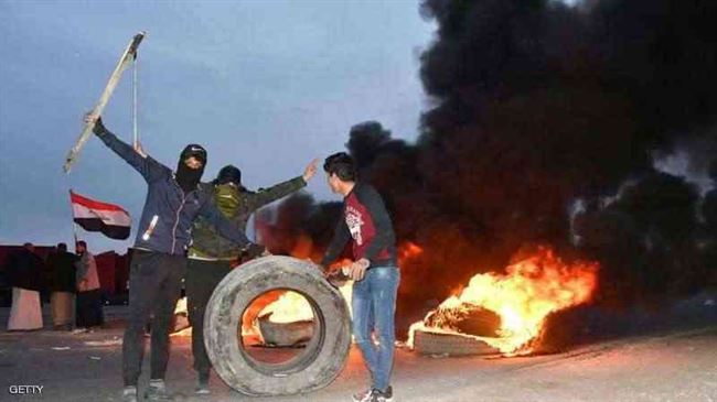 متظاهرو العراق يتحدون الطقس واستمرار إغلاق طرق وجسور