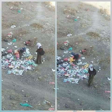 شاهد المعاناة.. فتاة وشقيقها يبحثون عن الطعام بالنفايات قبل الذهاب الى المدرسة في صنعاء